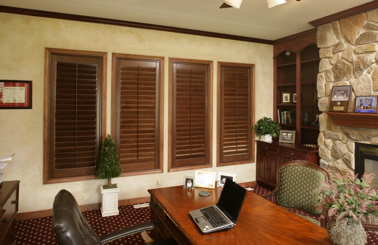 Wooden plantation shutters in a Chicago home office